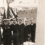 
						This was 3 May 1940 in La Valetta in Malta on ORP Garland representing the religious ceremony of the Hoisting of the Polish Flag. From left you see SubLieutenant Witold Poray-Wojciechowski (1913-1992).					