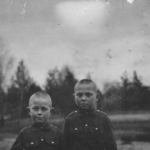 
						Czesław (on the left) and his non-identical twin brother Edmund in Marcinkance, near Grodno. Brothers are aged 7 yrs. Photo taken in 1926.					