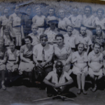 
						School class in Masindi 16.01.1944. Szkola Powszechna KL VI-ta N=1 Grono nauczycieiskie. 20 girls, 4 teachers and one African boy. Photo taken by Central Art Studio Ltd Kampala. Submitted by Richard Dojs					