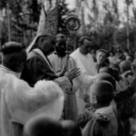 
						Sacrament of confirmation administered to children from the Soviet Exodus in Persia by Archbishop Gawlina, Roman Catholic Chief Chaplain of the Polish Armed Forces.					