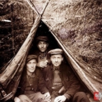 
						Hiding out with his brothers-in-arms in the forests and swaps near Cesvaine , Latvia 1952					