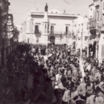 
						Festivities at Piazza Diaz in Casarano, Italy. In the back San Giovanni Elemosiniere column.					