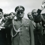 
						Tadeusz Sroka, Polish Navy. He survived the sinking of both ORP Grom and ORP Orkan. This photograph was taken in Gdynia. After the war Tadek was a prominent member of the Polish commuinity in Plymouth. He was also associated with the Federation of Plymouth and District Ex-Services Association; the 10th Destroyer Flotilla Association; the Plymouth-Gdynia Twinning Panel and the Anglo-Polish Krakowia Cultural Society.					