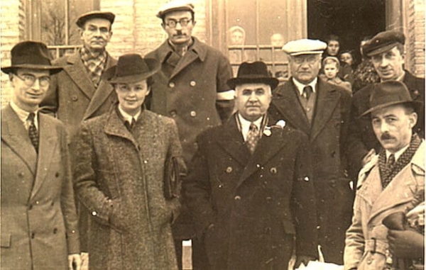 Jan Sulkowski (left-back row) at Civilian Camp No.1, Teheran, which housed Polish refugees, greeting an Iranian Minister.