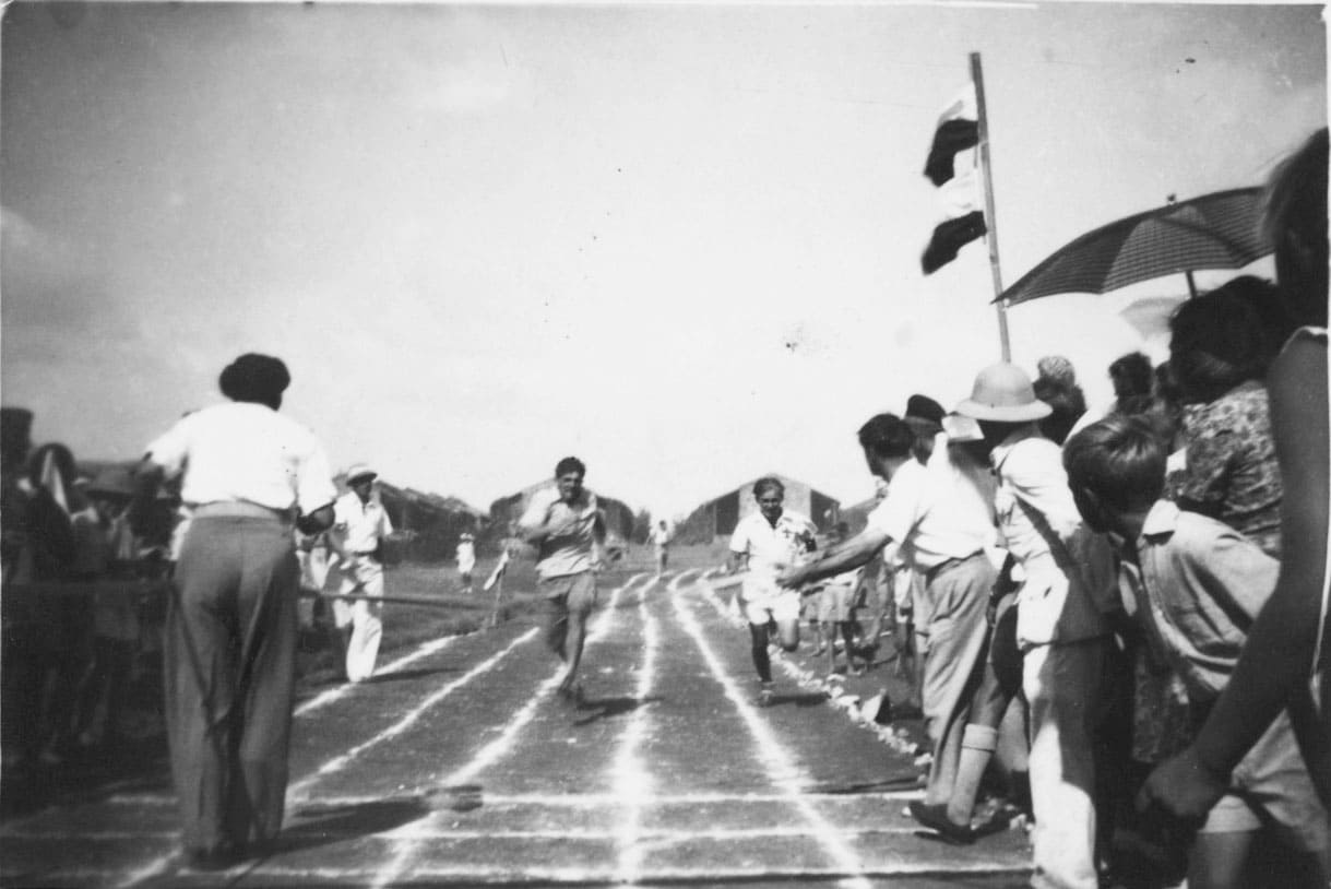 Athletics competition in the housing estate – Ryszard Godlewski and Zbigniew Nowicki running, Valivade, 1947; source: Poles from India Association