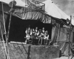 Performance on the occasion of the 3rd of May holiday organized in a transit camp for Polish refugees in Iran, Ahwaz, 1943; source: Poles from India Association Performance on the occasion of the 3rd of May holiday organized in a transit camp for Polish refugees in Iran, Ahwaz, 1943; source: Poles from India Association