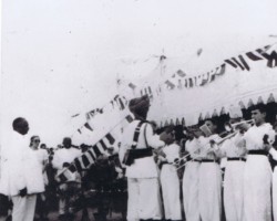 Playing of the anthems by the Balachadi estate orchestra – Polish, English and the principality of Nawanagar, ruled by Maharaja Digvijaysinhji – during the celebrations of May 3, Balachadi, May 3, 1944; source: from the collection of Wiesław Stypuła Playing of the anthems by the Balachadi estate orchestra – Polish, English and the principality of Nawanagar, ruled by Maharaja Digvijaysinhji – during the celebrations of May 3, Balachadi, May 3, 1944; source: from the collection of Wiesław Stypuła