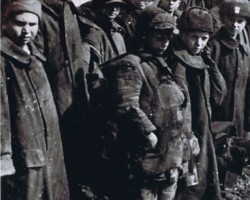 Polish children during the inspection of Polish units by General Władysław Anders, USSR, 1942; source: from the collection of Wiesław Stypuła Polish children during the inspection of Polish units by General Władysław Anders, USSR, 1942; source: from the collection of Wiesław Stypuła