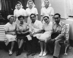 Employees of the Polish Red Cross in Bombay, sitting: Maria Widmańska, Kira Banasińska, Dr Jalal Bazergan, Wanda Łaguna, Dr Stanisław Konarski, standing: Władysława Kobuś, Rozalia Wojciechowska, Katarzyna Kisiówna, Bombay; source: Poles from India Association Employees of the Polish Red Cross in Bombay, sitting: Maria Widmańska, Kira Banasińska, Dr Jalal Bazergan, Wanda Łaguna, Dr Stanisław Konarski, standing: Władysława Kobuś, Rozalia Wojciechowska, Katarzyna Kisiówna, Bombay; source: Poles from India Association
