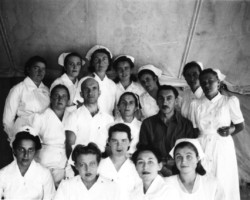 The hospital team of the Country Club camp with Dr. George Tiachow; source: Poles from India Association The hospital team of the Country Club camp with Dr. George Tiachow; source: Poles from India Association